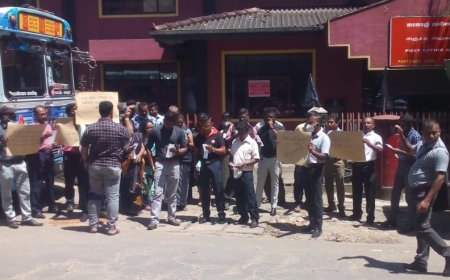 வருமான வரி முறைக்கு எதிராக தபால் ஊழியர்கள் ஹட்டனில் போராட்டம்